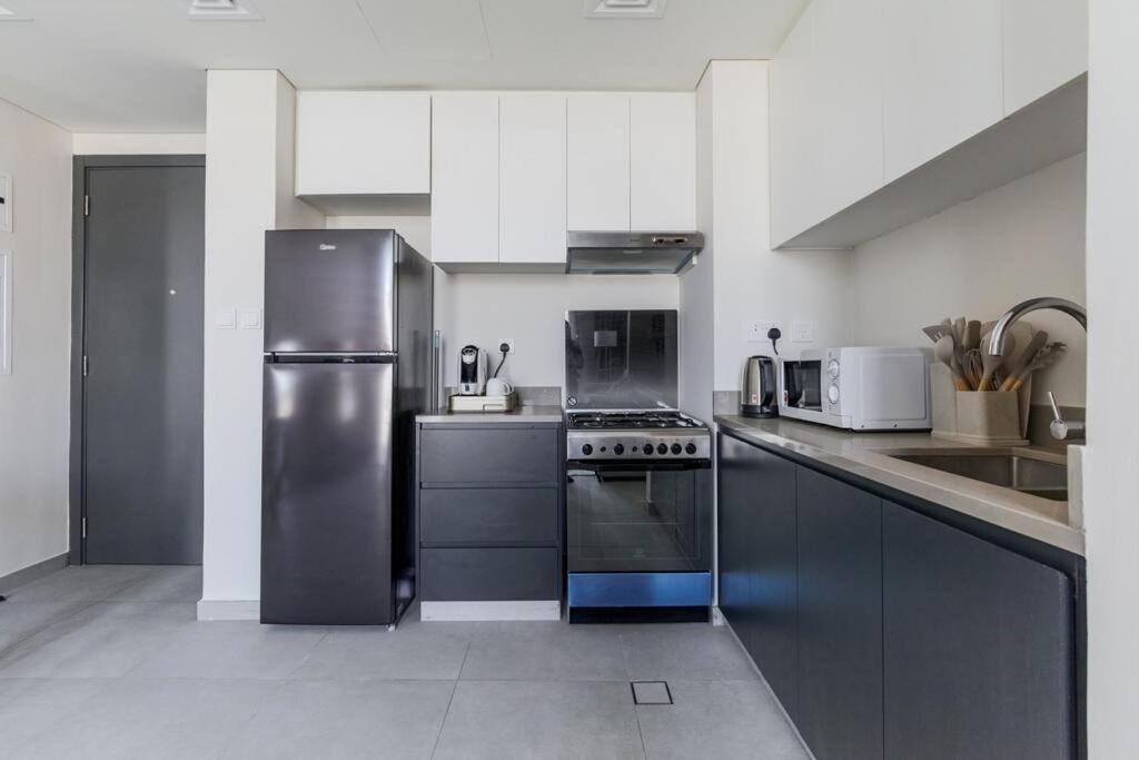 Sahab - Solo 1Br Apt In Al Jada ชาร์จาห์ ภายนอก รูปภาพ